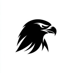 Obraz premium A striking black silhouette of a majestic eagle's head, ideal for branding, sports logos, or wildlife conservation themes, This graphic conveys strength and freedom in various contexts,