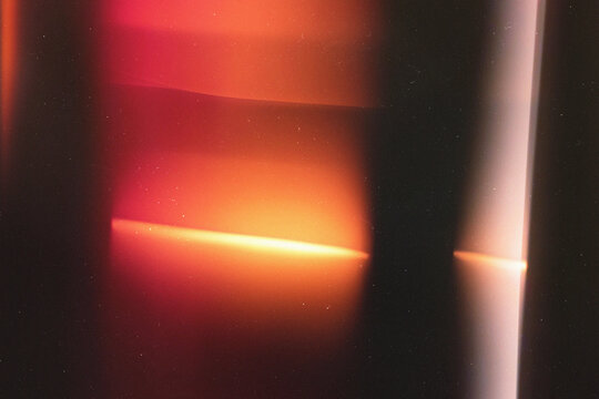 light leaks overlay effect with blurred red light,retro film distressed flare light leak on black background,abstract analog film burn orange light leak,Leaked camera poster photo effect mockup