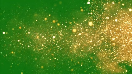 Gold glitter on green background - This video shows a cluster of golden glitter and sparkles on a bright green background. - Powered by Adobe