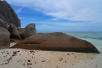Day view of the Anse Source d Argent beach with its granite boulders on La Digue island in the Seychelles, one of the most beautiful beaches in the world