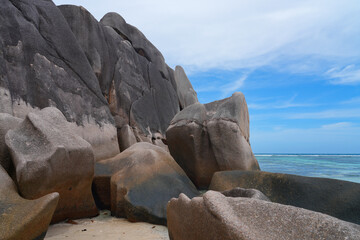 Day view of the Anse Source d Argent beach with its granite boulders on La Digue island in the Seychelles, one of the most beautiful beaches in the world