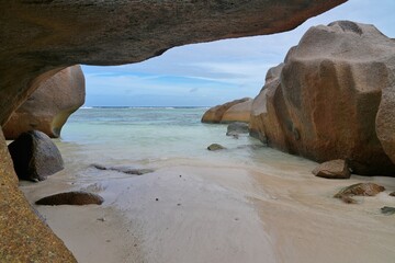 Day view of the Anse Source d Argent beach with its granite boulders on La Digue island in the Seychelles, one of the most beautiful beaches in the world