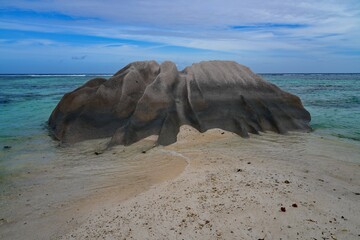 Day view of the Anse Source d Argent beach with its granite boulders on La Digue island in the Seychelles, one of the most beautiful beaches in the world