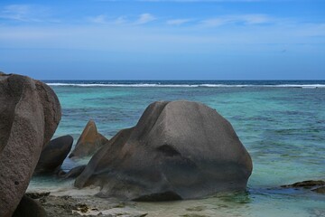 Day view of the Anse Source d Argent beach with its granite boulders on La Digue island in the Seychelles, one of the most beautiful beaches in the world