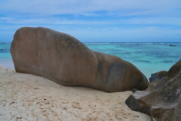 Day view of the Anse Source d Argent beach with its granite boulders on La Digue island in the Seychelles, one of the most beautiful beaches in the world