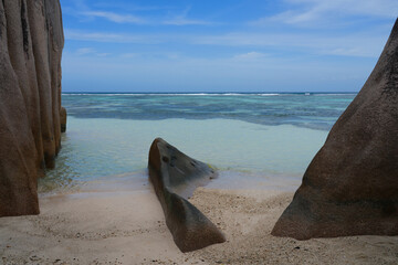 Day view of the Anse Source d Argent beach with its granite boulders on La Digue island in the Seychelles, one of the most beautiful beaches in the world