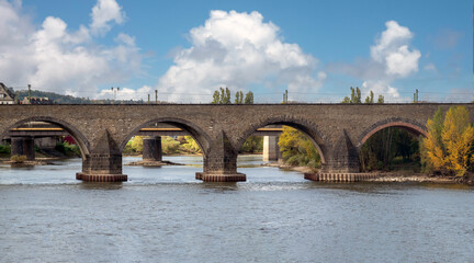 Fototapeta premium Old bridges crossing the river Moselle in the city of Koblenz, near the confluence with the Rhine river, Rhineland-Palatinate, Germany