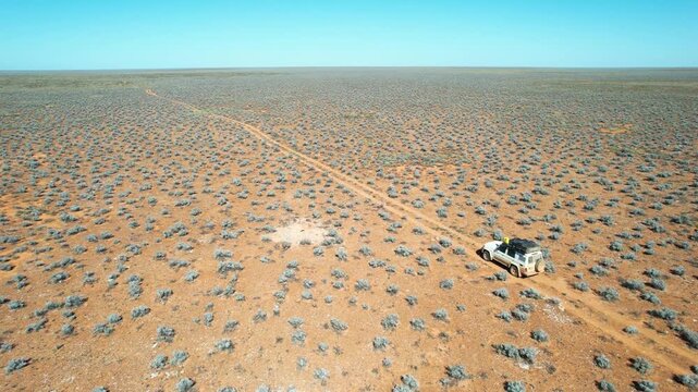 Driving across the flat desert plain