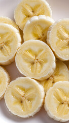 Fresh Banana Slices Close Up on White Background