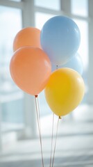 Colorful balloons in bright indoor setting for celebratory themes