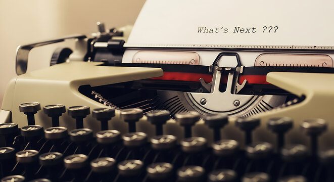 Vintage typewriter with paper close-up view in a creative office setting