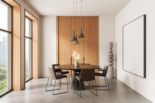 Modern dining room interior with round table, chairs, pendant lights, wooden accents and blank wall art mockup in bright minimalist layout concept. 3D Rendering