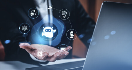 Businessman interacting with holographic chatbot interface and AI assistant icons above hand on futuristic digital background in tech innovation concept..