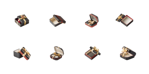 Collection of various black and red jewelry or small gift boxes featuring gold ribbon accents shown open and closed on transparent background