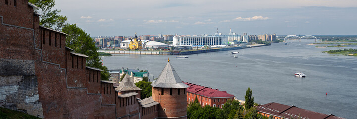 Nizhny Novgorod, Russia. View of the Nizhny Novgorod Kremlin. In the distance is a church and a stadium. At the confluence of the Oka and Volga Rivers, the name of the district in Russian is "Strelka"