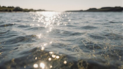 Sunlight Reflecting on Rippling Water Surface.