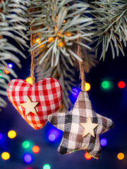 Plush Plaid Ornaments Hanging From Pine Branches With Fairy Lights For Christmas Decor Seasonal Display