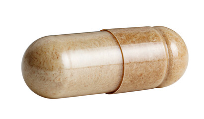 Close-up of beige pill capsule with textured contents