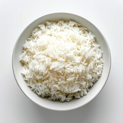 A high-angle close-up view of a bowl of cooked white rice