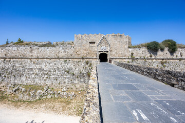 Red Gate from the Middle Ages in city wall of historic old town of Rhodes island, Greece