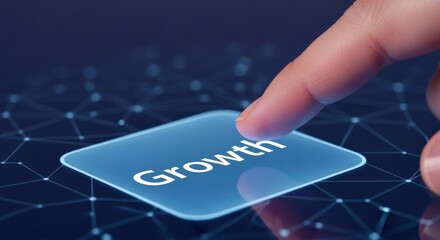 Finger touching a growth button on a digital interface representing business development and innovation