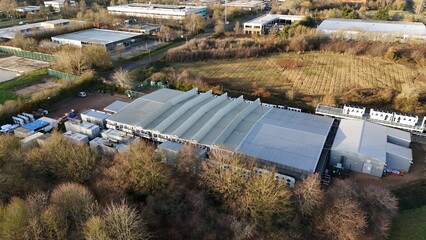 Aerial drone view of large scale cutting-edge technology and futuristic infrastructure of a large-scale data center in Milton Keynes, UK. AI cloud quantum computing. 