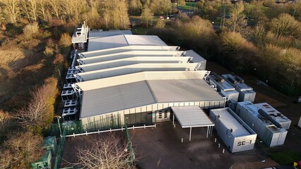 Aerial drone view of large scale cutting-edge technology and futuristic infrastructure of a large-scale data center in Milton Keynes, UK. AI cloud quantum computing. 