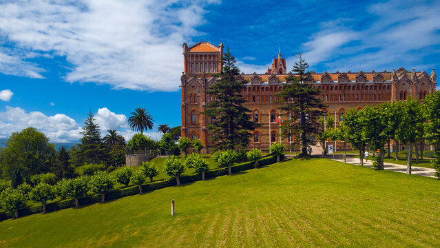 Comillas, Spain - 21 July 2025: Top view of University Center or Comillas Pontifical University or Universidad Pontificia is a main university in Comillas city, Spain