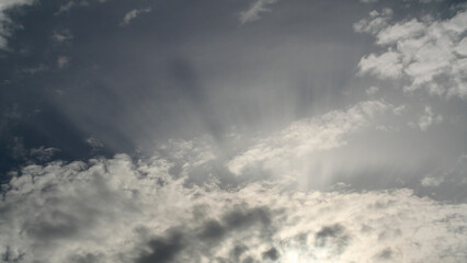 Calm blue sky with clouds of different shapes, background image
