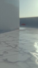 Marble tiled flooring reflecting light in a clean, abstract, empty interior space