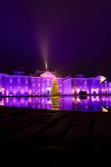 Apeldoorn, The Netherlands - December 20, 2025: Royal Palace het Loo, National museum, illuminated in pink colors during Christmas period in Apeldoorn, The Netehrlands