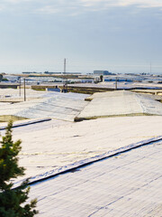 Plastic greenhouses on coast, Spain