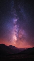 Night sky landscape milky way over mountains with dark silhouettes