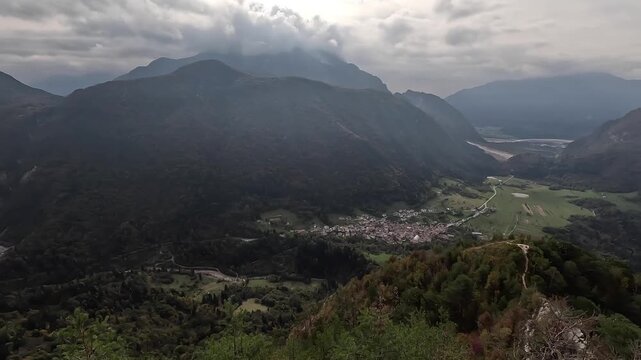 Panoramic aerial-style view over Monte Giaideit and the Tagliamento valley in Friuli Venezia Giulia, Italy, on a clear winter day.