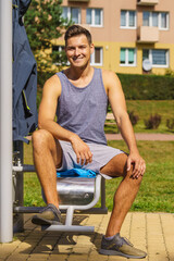 Young man relaxing after outdoor workout