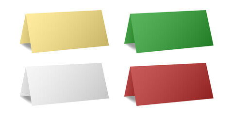 Set of table cards. White, gold, green, and red bent sheets. Tent table card, nameplate