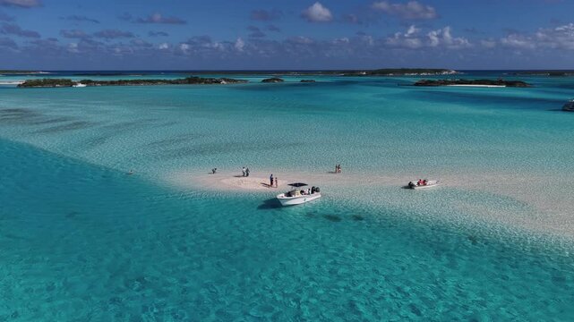 Exuma Skyline In Exuma Islands Black Point Bahamas. Motorboat Speeding On Tropical Landscape In A Beautiful Day. Shore Horizon Beach Sea. Outdoor Beach Panorama. Exuma Islands Black Point.