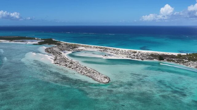 Half Moon Bay In Providenciales Overseas Territory Turks And Caicos Islands. Breathtaking Aerial View Of A Lush Tropical Coastline Scenery. Shore Clouds Beach Sea. Shore Beach Panoramic.