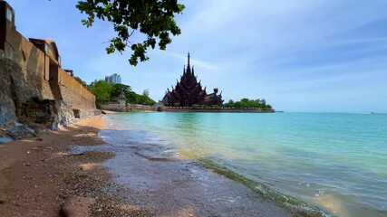 Pattaya, Thailand, June 7, 2022: The Temple of Truth (Prasat Sut Jatum), a beautiful wooden Buddhist temple by the sea. The Temple of Truth in Pattaya. A giant wooden structure located on Naklua Cape.