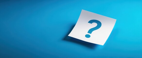 The question mark sticky note casting a soft shadow on blue background
