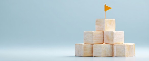 The Wooden Block Pyramid with Orange Flag Symbolizing Success Leadership and Goal Achievement