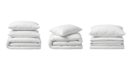 Stacks of neatly folded and fluffy white bedding pillows on isolated transparent background