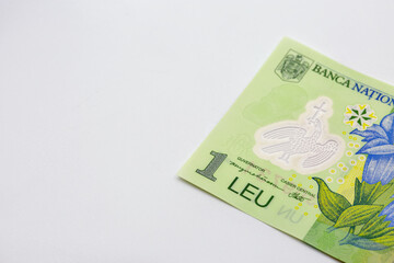 Romanian one leu banknote closeup on white background