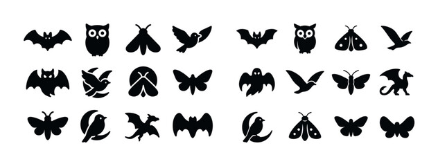Fototapeta premium Silhouette icons of diverse flying animals: bats, owls, birds, b
