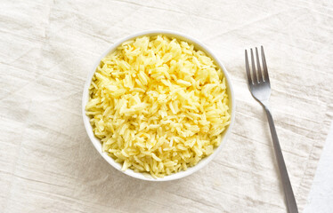 Boiled saffron rice in bowl