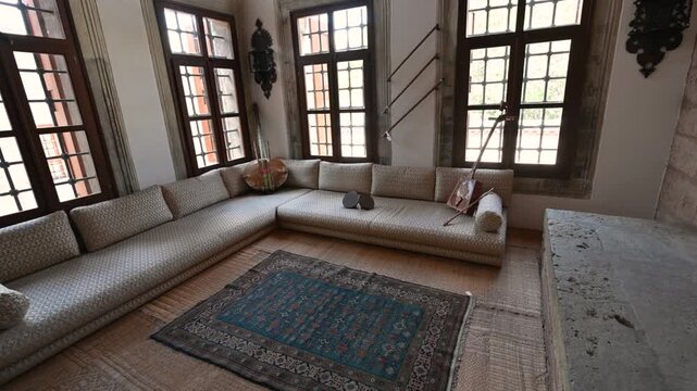 Istanbul, Turkey, August 1, 2025. One of the living rooms of Topkapi Palace with musical instruments. Intense natural light from the numerous windows. Travel destinations.