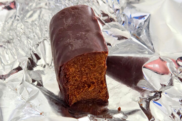 Chocolate-Covered Gingerbread Treat on Foil - Holiday Dessert Photography for Seasonal Promotions