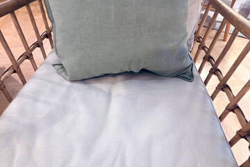 Cozy Seating Arrangement with Soft Cushion on Wooden Chair for Home Decor