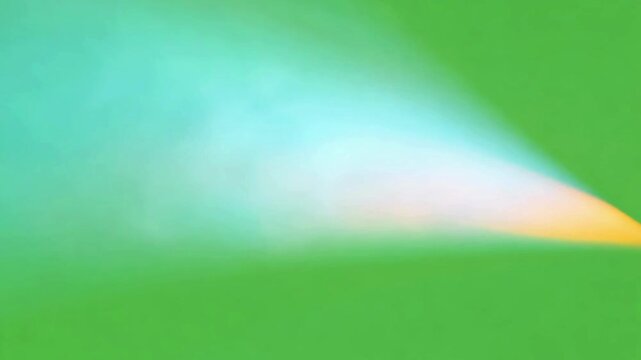 Magic energy projectile or colored smoke fireball flying on green screen, fantasy spell shot animation for game and movie vfx.