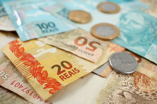 several Brazilian Real banknotes